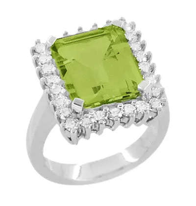 1950's Emerald Cut Peridot Ballerina Ring with Diamonds in 18 Karat White Gold