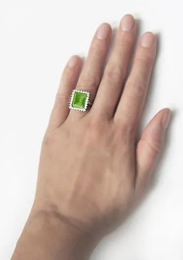 1950's Emerald Cut Peridot Ballerina Ring with Diamonds in 18 Karat White Gold