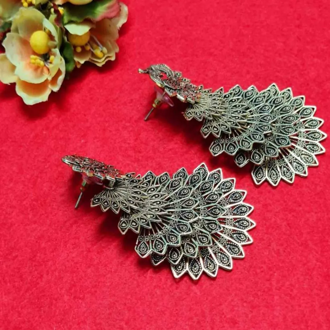 BANDISH Oxidised Silver Antique Peacock Drop Earrings