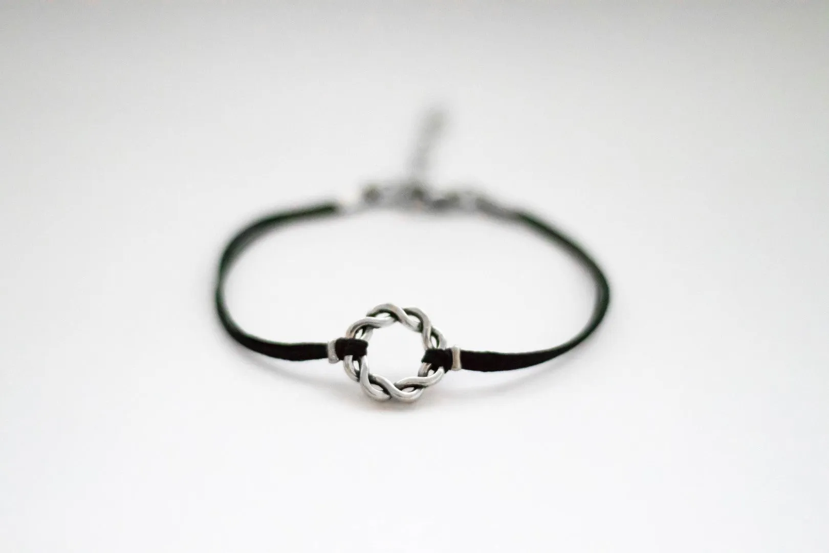 Karma bracelet, silver braided circle charm and black string, yoga jewelry