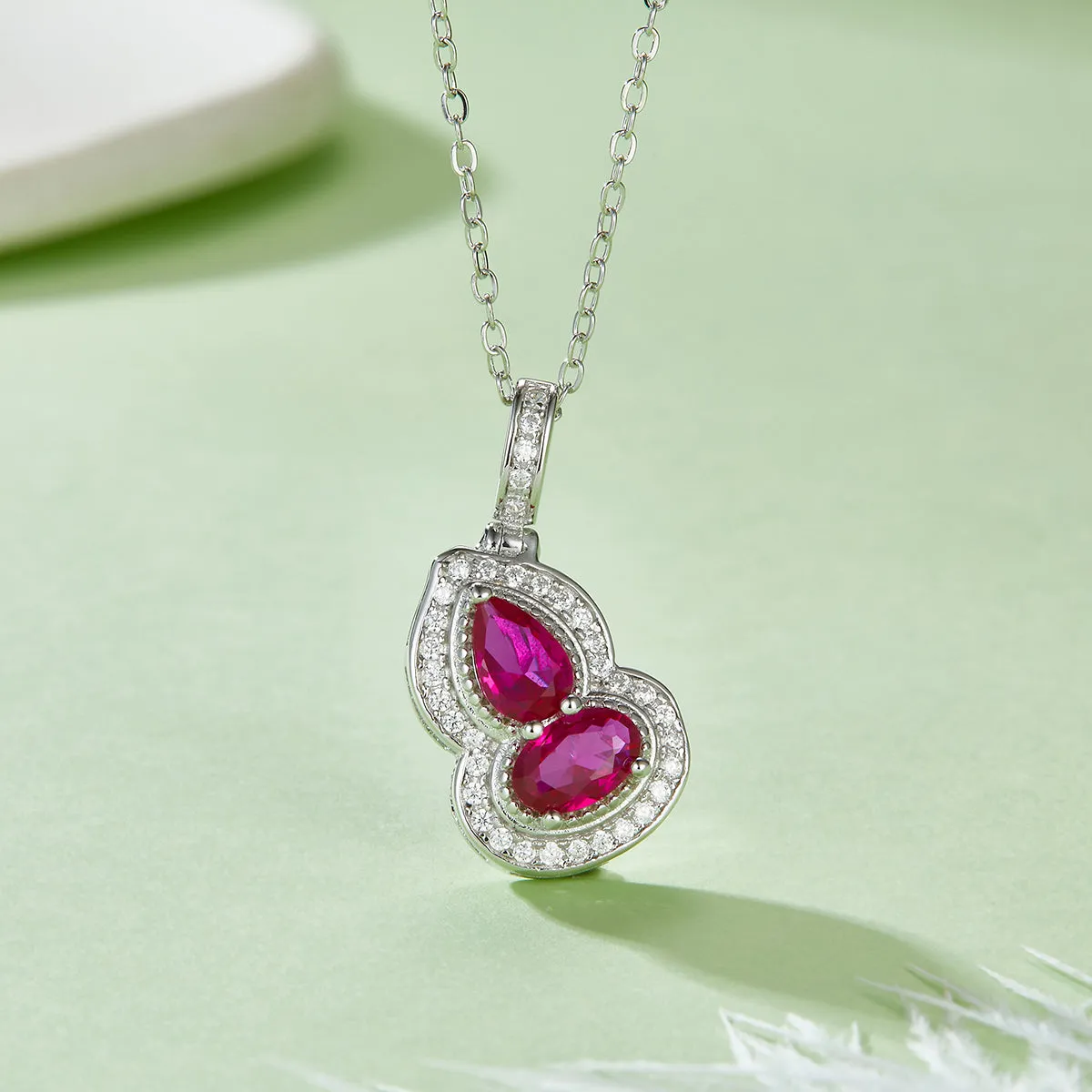 Lab Created Ruby Halo Necklace in S925 Silver with Platinum Plating – 1.0 Carat Gourd Design