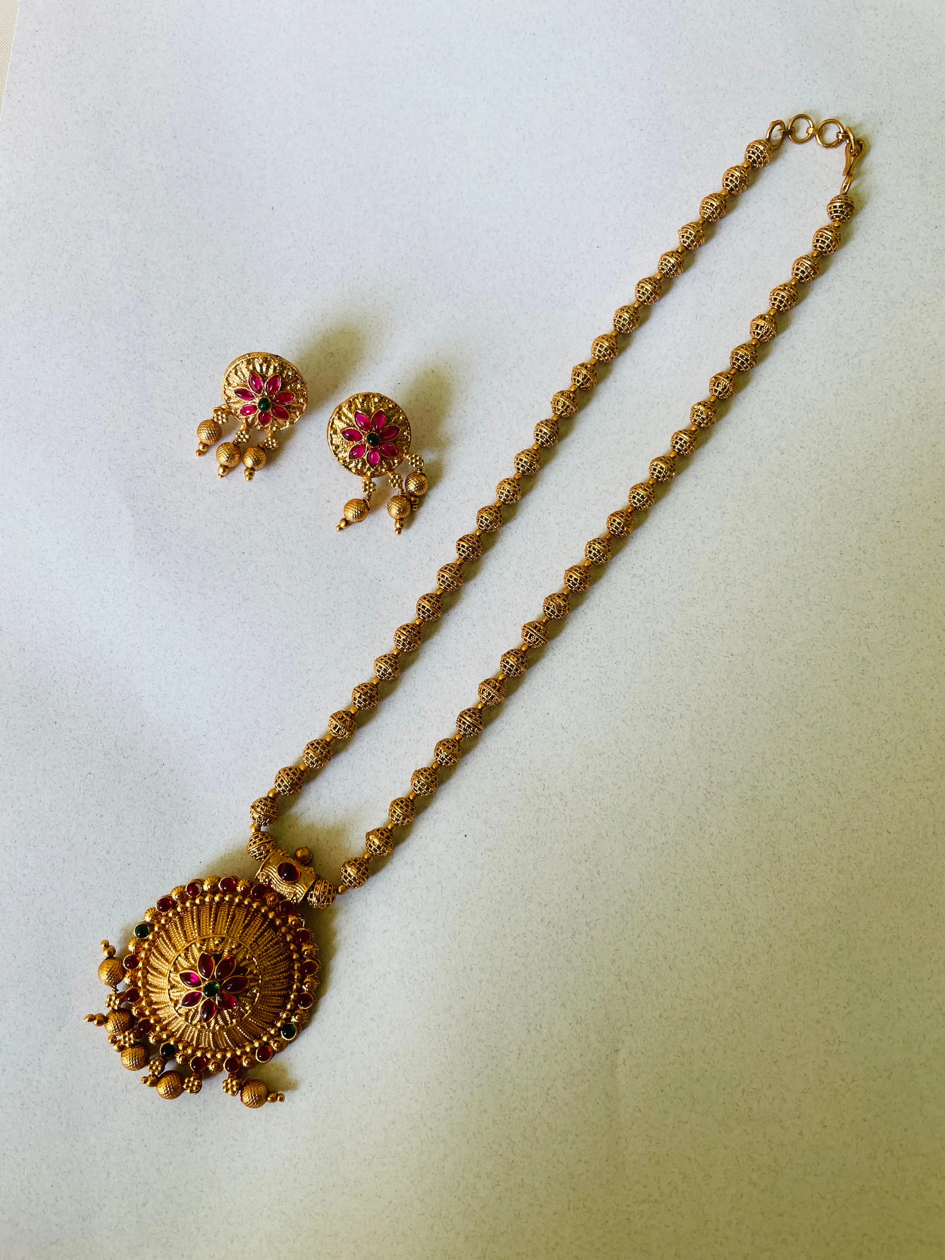 Mani golden beads pendent necklace