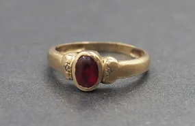 Ruby & Cubic Zirconia 9ct Yellow Gold Ring